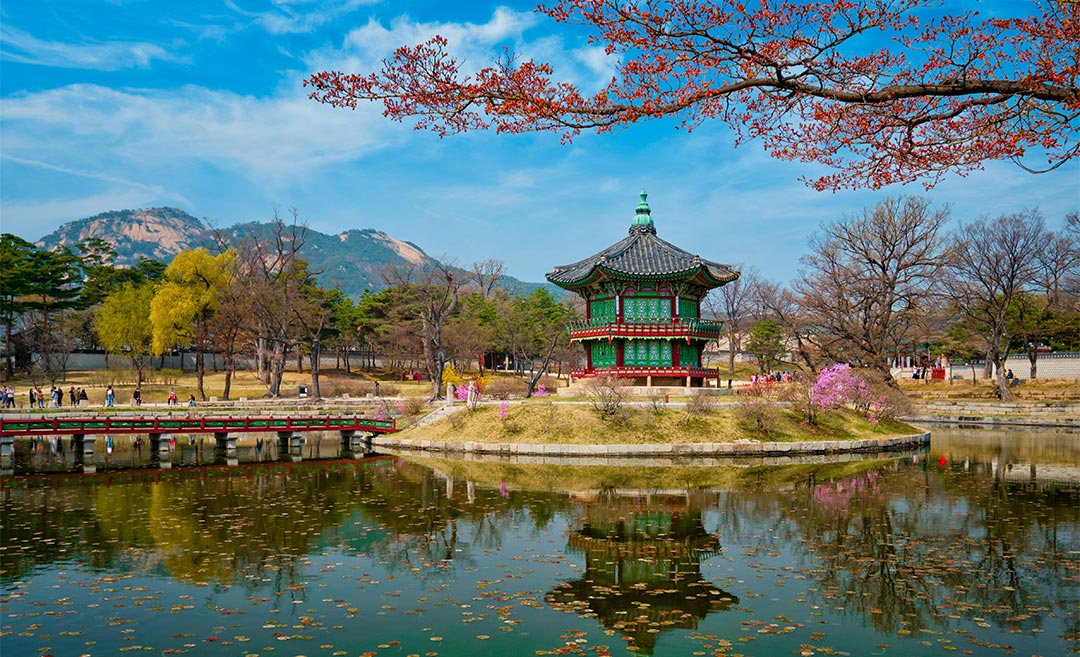 The scenic Hyangwonjeong Pavilion at Gyeongbokgung Palace, Seoul, reflecting in still water during a quiet morning—a bucket-list destination that requires a valid K-ETA for Malaysian travellers.