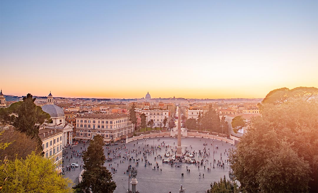 High-angle aerial view of Piazza del Popolo in Rome with ancient Italian architecture, silhouettes, and a warm sunset sky