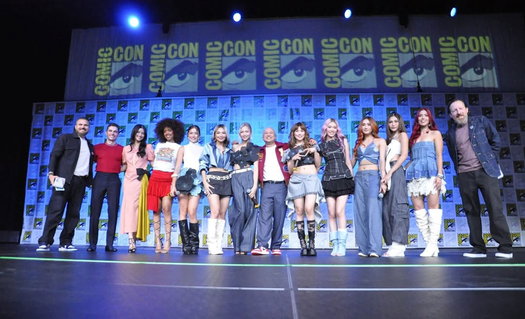 Filmmakers and stars of DreamWorks Animation's Forgotten Island lining up on stage during a Comic-Con panel presentation.